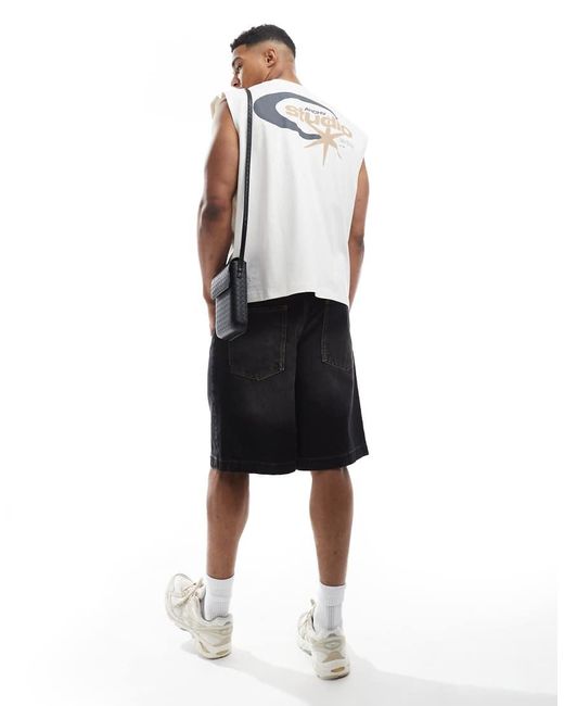 Camiseta Blanca Sin Mangas Extragrande Con Estampado Gráfico De Texto Urbano De -Blanco ASOS de hombre de color White