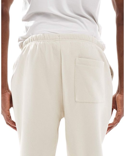 ASOS White Tapered Fit Fixed Hem joggers With Pleats for men