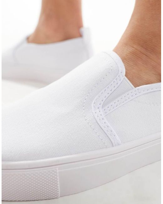 ASOS White Dotty Slip On Plimsolls