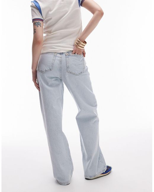 Jeans a colonna a vita medio alta candeggiati di Topshop Unique in White