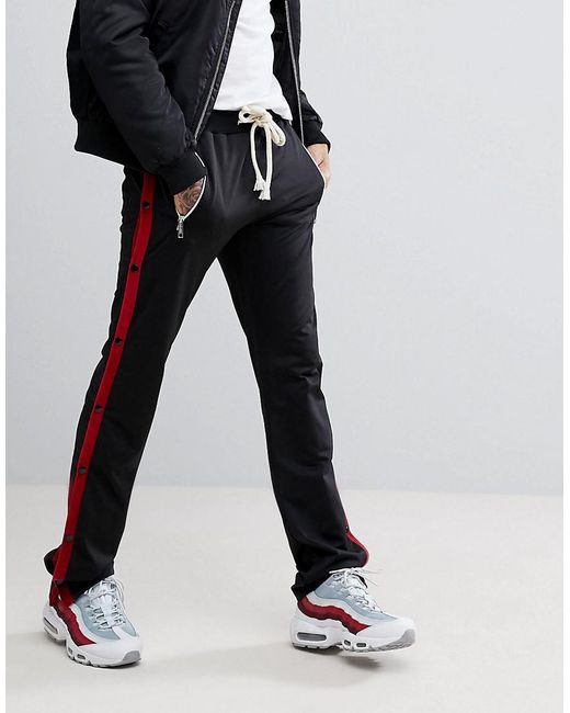 Pantalon de jogging ajust avec boutons pression BoohooMAN pour homme en coloris Black