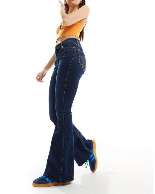 Jeans a zampa a vita alta vintage lavaggio scuro di Hollister in Blue