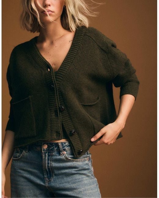 Gilet en maille avec col à superposition Stradivarius en coloris Blue