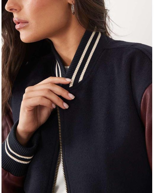 GOOD AMERICAN Blue Faux Leather Varsity Jacket