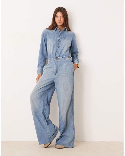 Wrangler Western Jumpsuit Met Wijde Pijpen En Onafgewerkte Zomen in het Blue