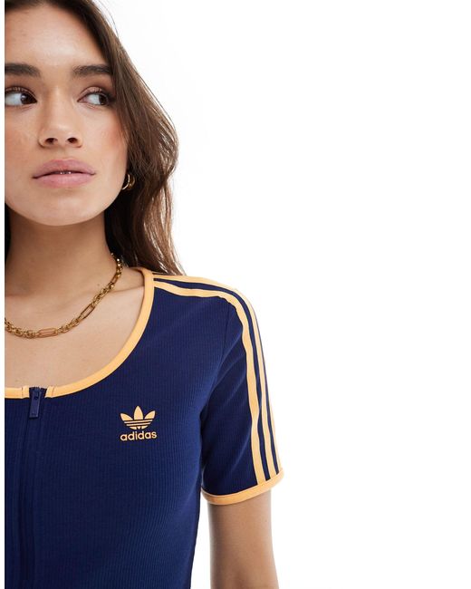 Crop top côtelé à fermeture éclair - foncé Adidas Originals en coloris Blue
