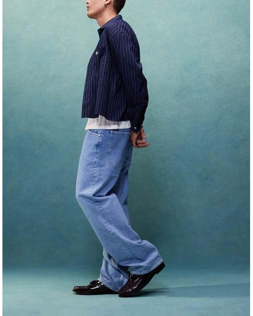 Vaqueros Holgados Con Lavado Claro Aiden De -Azul Tommy Hilfiger de hombre de color Blue