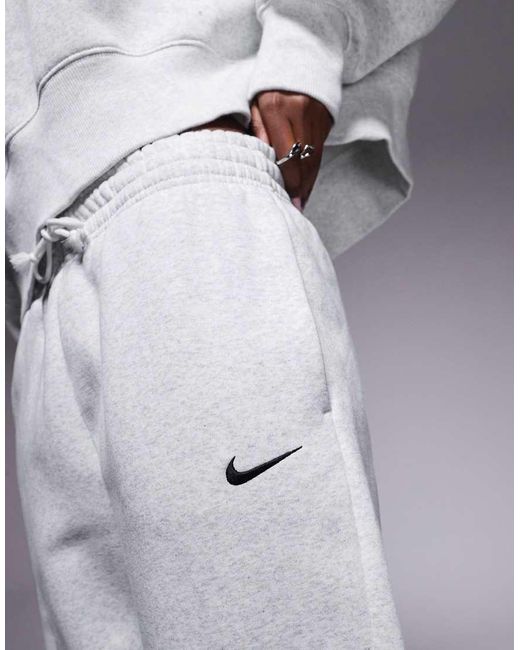 Joggers Grises Extragrandes De Talle Alto Phoenix Fleece De Nike de color Blue