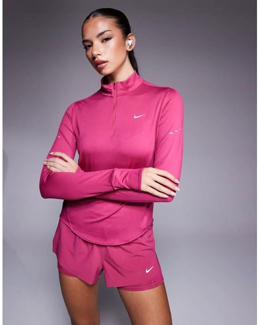 pink nike half zip top