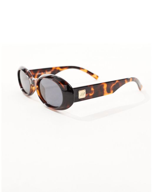 Work it - occhiali da sole ovali color tartaruga scuro di Le Specs in Brown