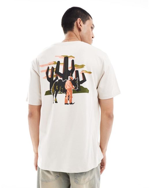 Camiseta Blanco Holgada Con Estampado De Vaquero En La Espalda De Wrangler de hombre de color White