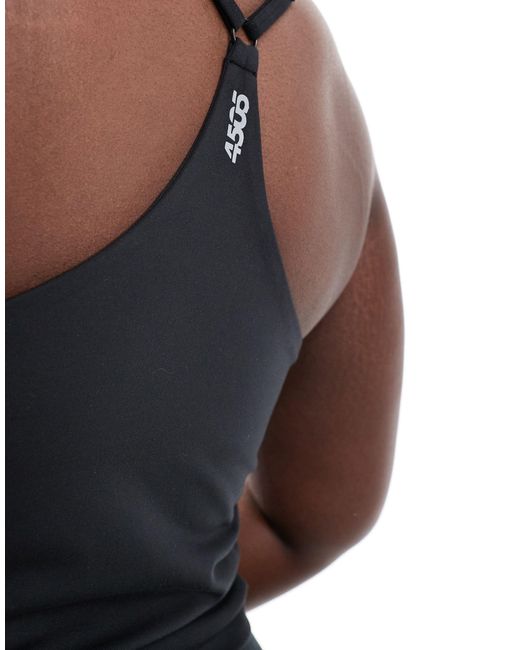 Curve - icon - canottiera da yoga morbida al tatto nera con reggiseno interno di ASOS 4505 in Blue