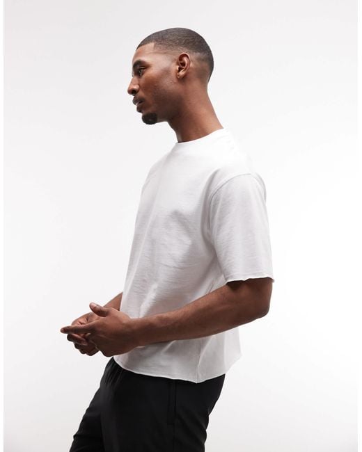 4505 – cropped-trainings-t-shirt aus schnelltrocknender baumwolle in White für Herren