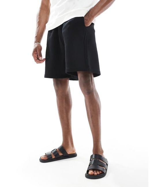 Pantalones Cortos Negros Básicos Extragrandes De Largo Medio De ASOS de hombre de color Black