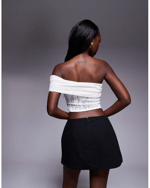 Gigi - mini jupe-short fendue sur le côté en coton Princess Polly en coloris Black