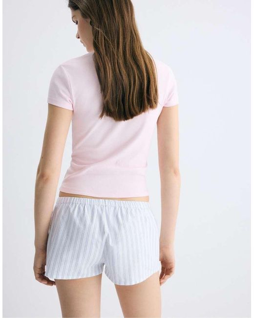Stradivarius White Striped Buttoned Mini Shorts
