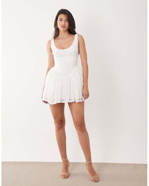 Aria Cove White Lace Scoop Neck Corset Detail Frill Hem Mini Dress