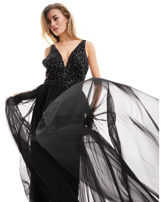 L'invitée - robe longue et ornementée à col en v Beauut en coloris Black