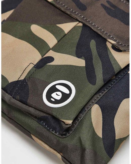 Bandolera Utilitaria Con Estampado De Camuflaje De -Verde Aape By A Bathing Ape de color Black