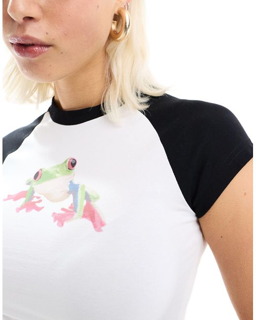 The Ragged Priest White Crop Raglan T-shirt With Frog Graphic