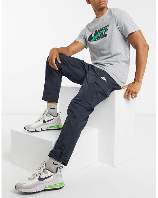 Nike – club – gewebte cargo-jogginghose mit bündchen in Black für Herren