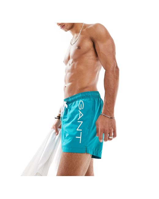 Pantaloncini da bagno con scritta laterale del logo di Gant in Blue da Uomo
