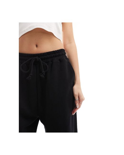 ASOS Black Wide Leg Trackies With Ripped Knee