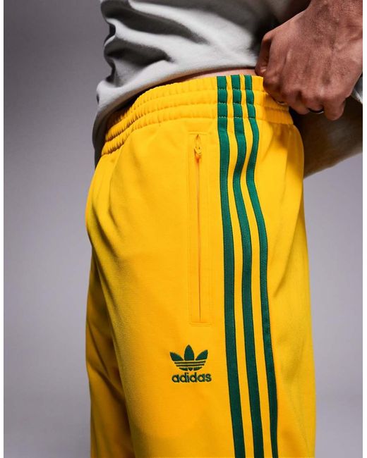 Firebird di Adidas Originals in Yellow da Uomo