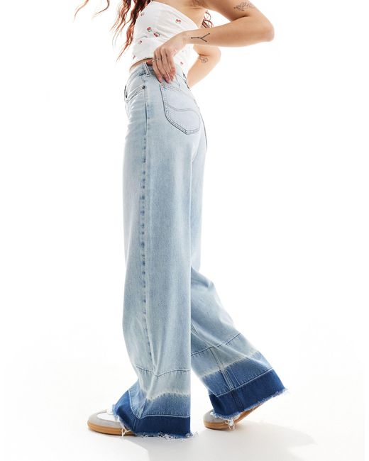 Stella - jeans ampi svasati lavaggio chiaro con orlo scucito di Lee Jeans in Blue