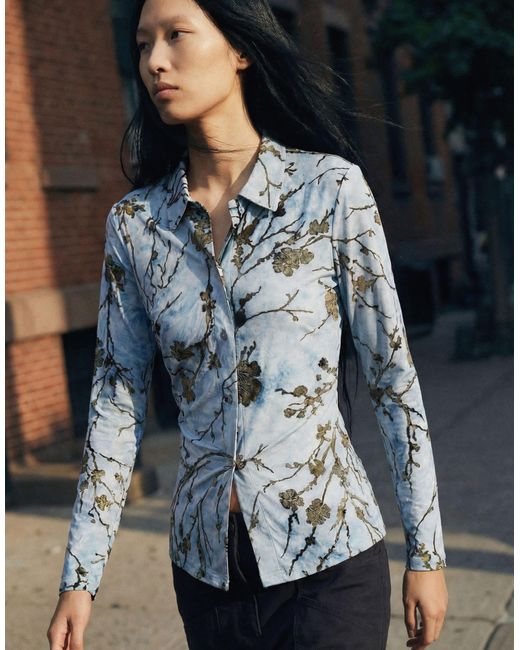 Top floqué Desigual en coloris Blue