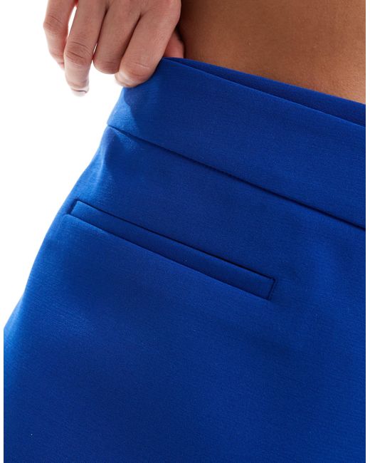 Jupe-short portefeuille ajustée Stradivarius en coloris Blue