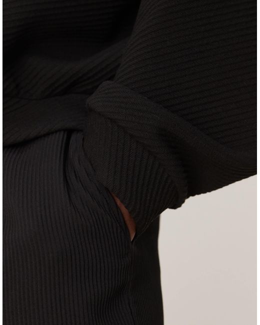 ASOS – schmal zulaufende plissee-jogginghose in Black für Herren