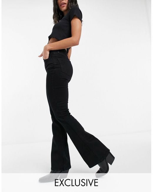 Reclaimed (vintage) Black Inspired 79 Super Stretch Flare Jean