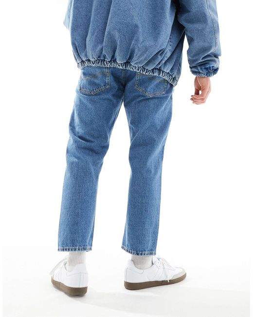 Mark - jeans larghi cropped lavaggio medio di Jack & Jones in Blue da Uomo