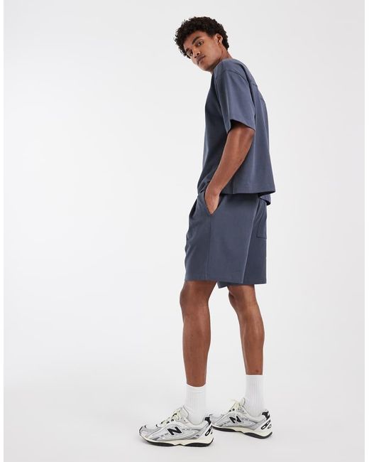 ASOS Blue Circular Design Collection Pleated Oversized Jersey Shorts for men