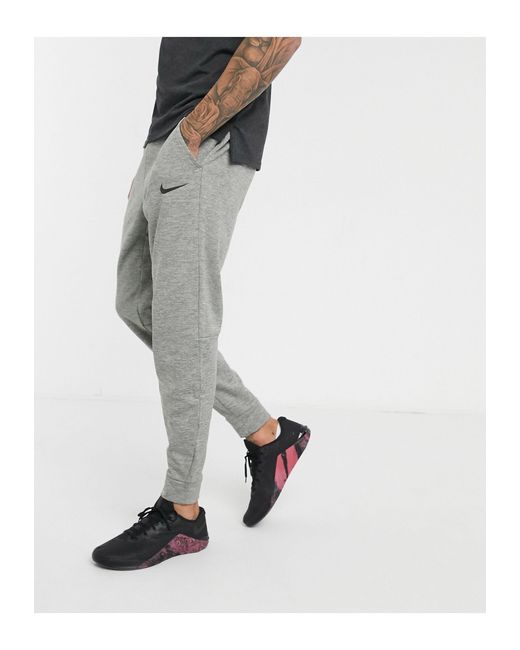 nike training tapered jogging bottoms grey