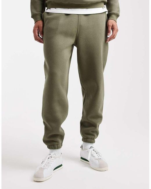 Joggers Caquis Básicos De Corte Tapered De -Verde ASOS de hombre de color Green