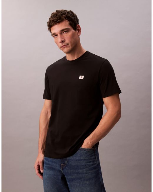 T-shirt avec écusson à logo Calvin Klein pour homme en coloris Black