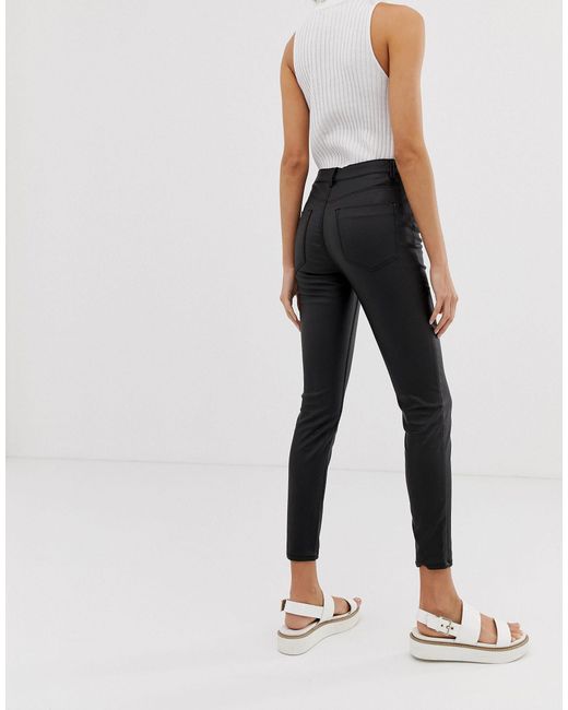 Stradivarius Coated Denim Skinny Jeans in Black | Lyst