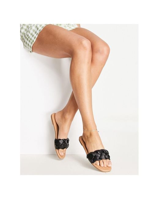 black plaited mules