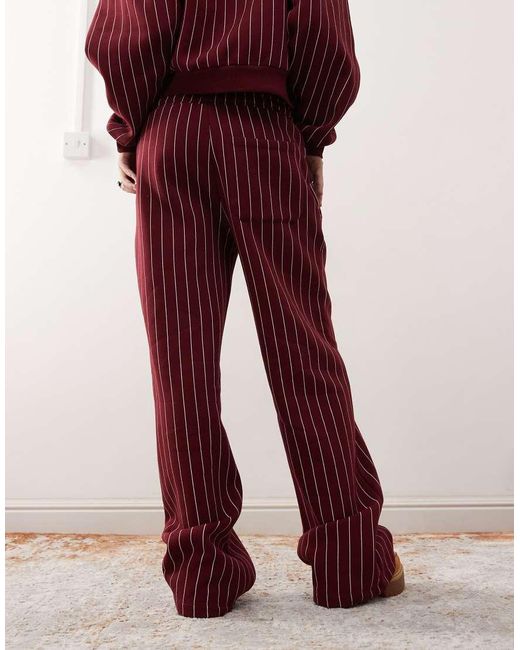 Reclaimed (vintage) Joggingbroek Met Wijde Pijpen in het Red