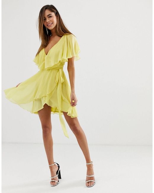 cape back dipped hem dress