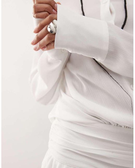 Vestido Camisero Corto Con Botones Delanteros, Cintura Entallada Y Volante En La Falda Girls De Lioness de color White