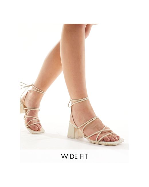 Idris - sandales à talon mi-haut avec liens aux chevilles - crème Public Desire en coloris White