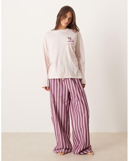 ASOS Oversized Pyjamaset Van T-Shirt Met Cocktailprint En Lange Mouwen En Gestreepte Broek Met Wijde Pijpen in het Pink