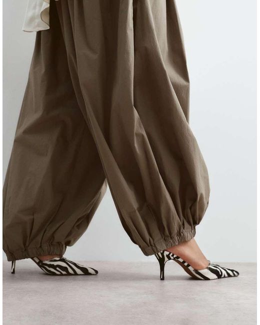 ARRANGE Green Curve Waist Seam Balloon Leg Trousers