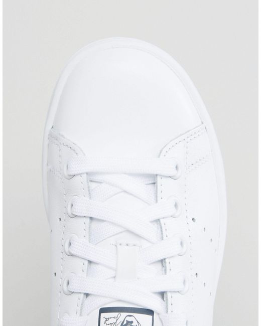 adidas originals stan smith sneakers in white and navy