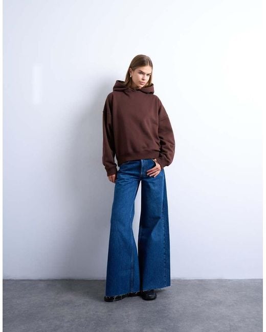 TOPSHOP Blue Horizon Mid Rise Wide Leg Jean With Raw Hem
