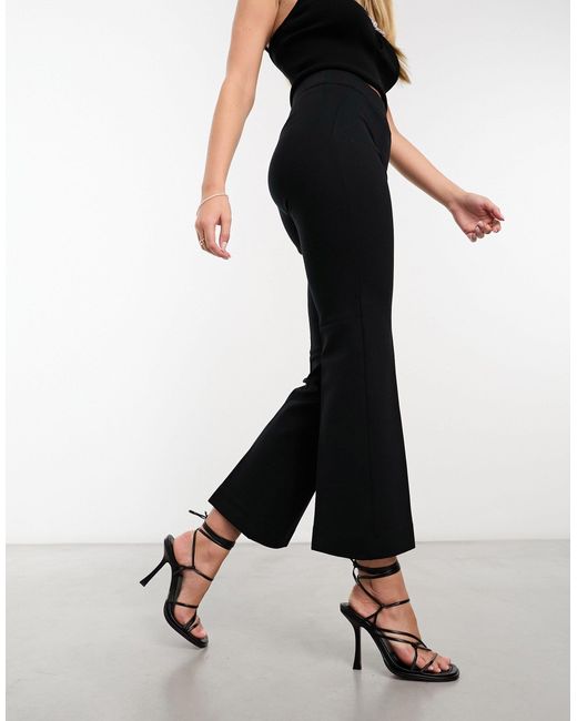 SPANX high-waisted Flared Slit Trousers - Farfetch