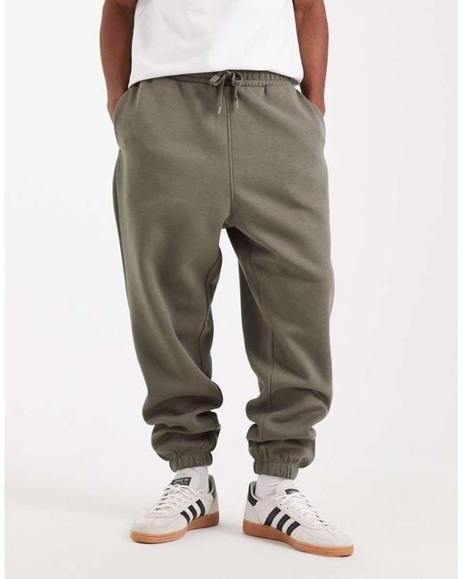 Joggers Caquis Holgados Básicos Essentials De -Verde ASOS de hombre de color Green